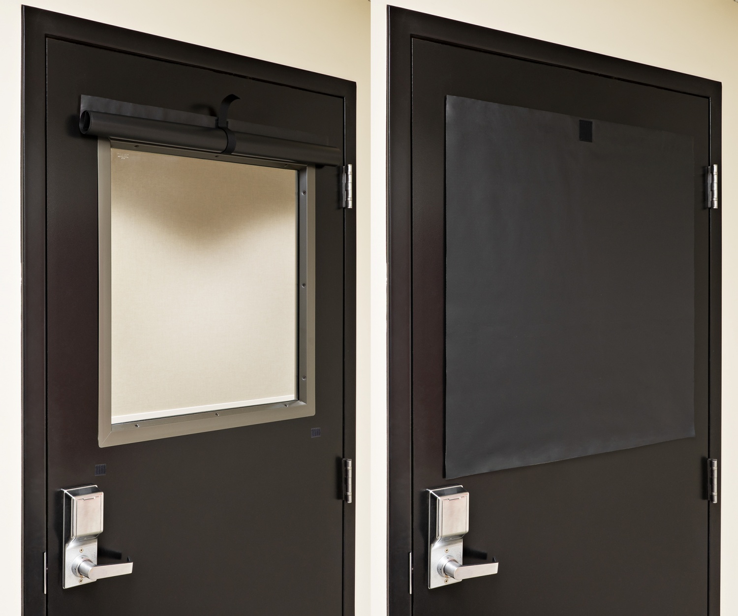 Black ALP lockdown shade installed on a classroom door